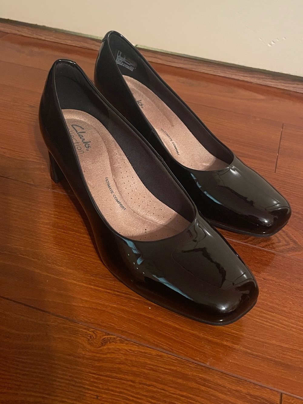 Clarks Women’s Black Patent Mid-Heel Pump